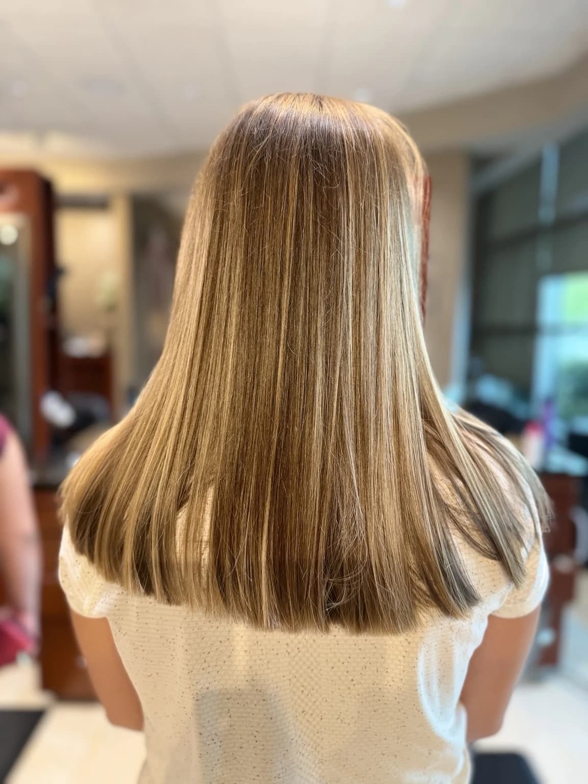 A genuine dimensional blonde finish from Shirin's salon archive